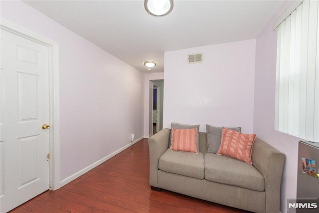 4310 Newkirk Ave, North Bergen, NJ 07047 - living area featuring wood finished floors and baseboards