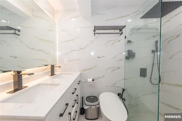 4310 Newkirk Ave, North Bergen, NJ 07047 - full bathroom featuring tile walls, toilet, a marble finish shower, and double vanity