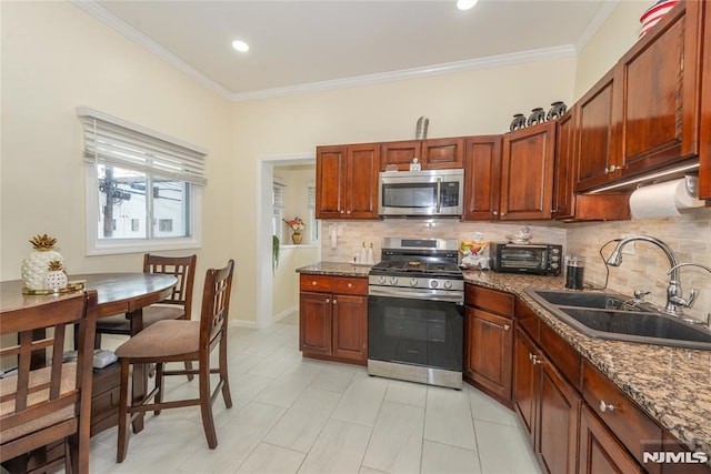 4310 Newkirk Ave, North Bergen, NJ 07047 - kitchen with stainless steel appliances, a sink, backsplash, ornamental molding, and dark stone counters