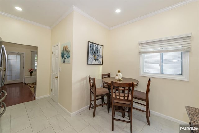 4310 Newkirk Ave, North Bergen, NJ 07047 - dining space with ornamental molding, baseboards, and recessed lighting
