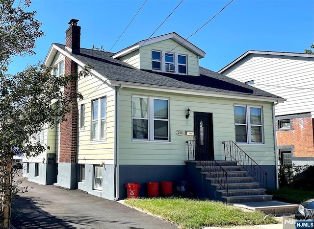 208 Wayne Ave, Cliffside Park, NJ 07010 - bungalow-style house with a chimney and roof with shingles