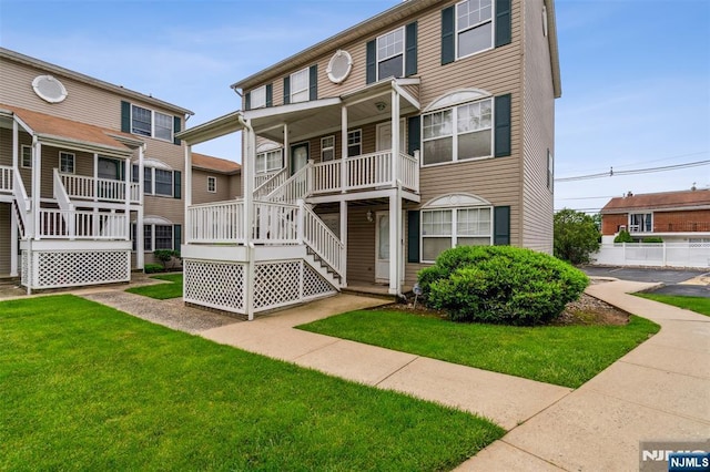 239 40th St Unit C0007, Irvington, NJ 07111 - view of front facade featuring a front yard and stairs