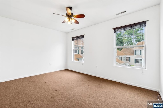 239 40th St Unit C0007, Irvington, NJ 07111 - spare room with ceiling fan, carpet flooring, and baseboards