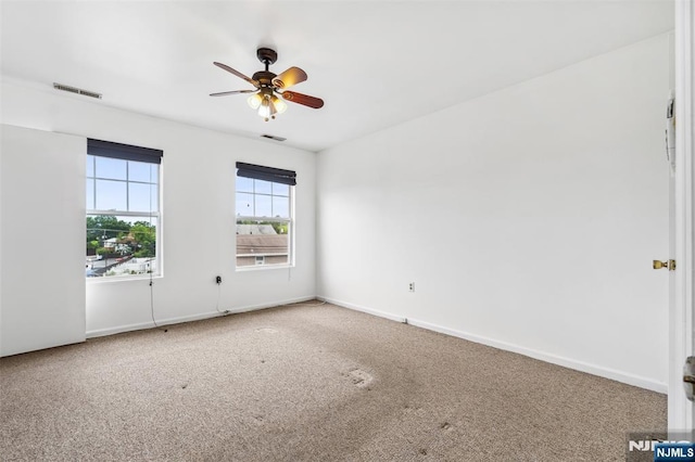 239 40th St Unit C0007, Irvington, NJ 07111 - carpeted spare room featuring a ceiling fan and baseboards