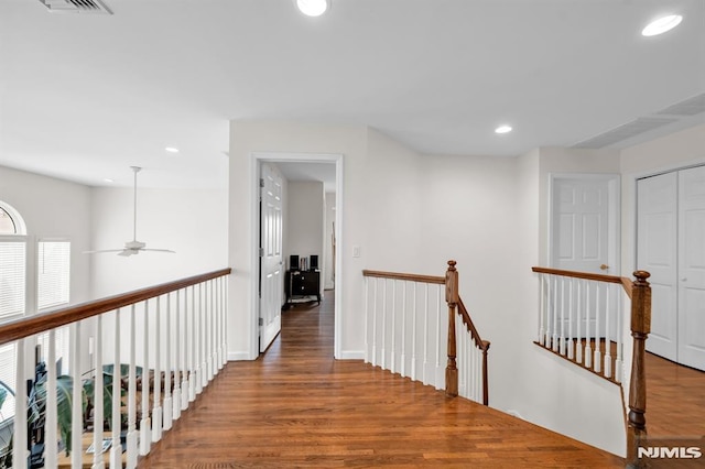 755 Jefferson Ave, Cliffside Park, NJ 07010 - hallway with an upstairs landing, wood finished floors, and recessed lighting