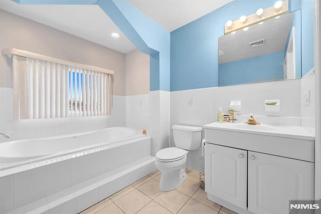 755 Jefferson Ave, Cliffside Park, NJ 07010 - bathroom featuring a bath, toilet, vanity, and tile patterned floors