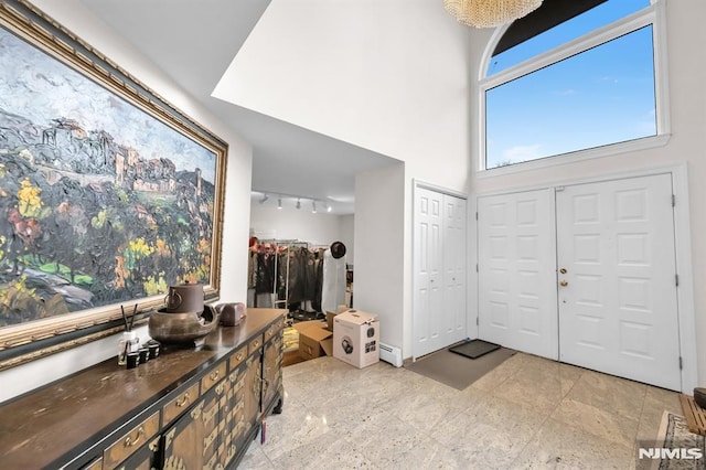 755 Jefferson Ave, Cliffside Park, NJ 07010 - foyer entrance featuring rail lighting and a towering ceiling