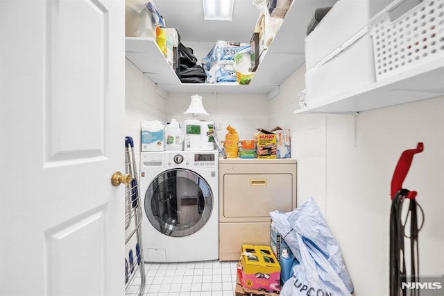 755 Jefferson Ave, Cliffside Park, NJ 07010 - laundry area featuring separate washer and dryer and light tile patterned floors