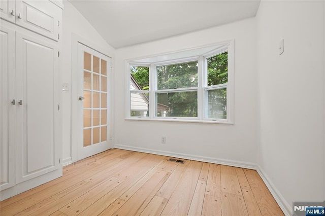 41 Oakland Ave, Westwood, NJ 07675 - empty room with light wood-type flooring, baseboards, and lofted ceiling