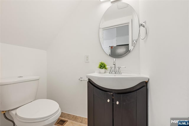 41 Oakland Ave, Westwood, NJ 07675 - bathroom featuring vanity, toilet, baseboards, and tile patterned floors