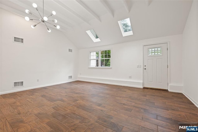 41 Oakland Ave, Westwood, NJ 07675 - entrance foyer featuring a skylight, dark wood finished floors, a chandelier, and baseboards