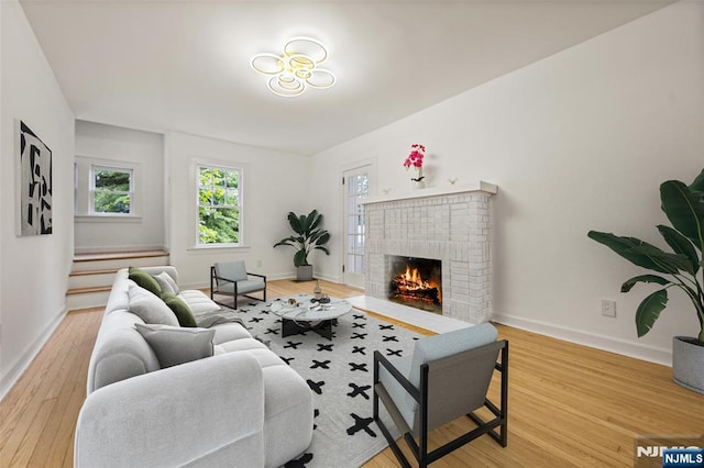 41 Oakland Ave, Westwood, NJ 07675 - living area with wood finished floors, a fireplace, and baseboards