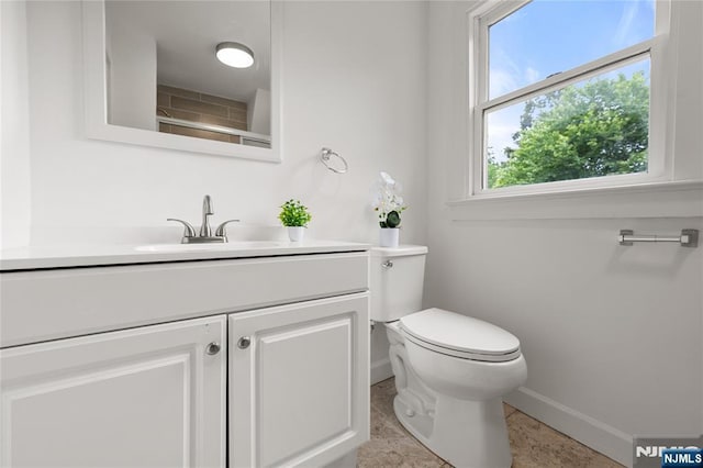 41 Oakland Ave, Westwood, NJ 07675 - bathroom featuring baseboards, toilet, and vanity