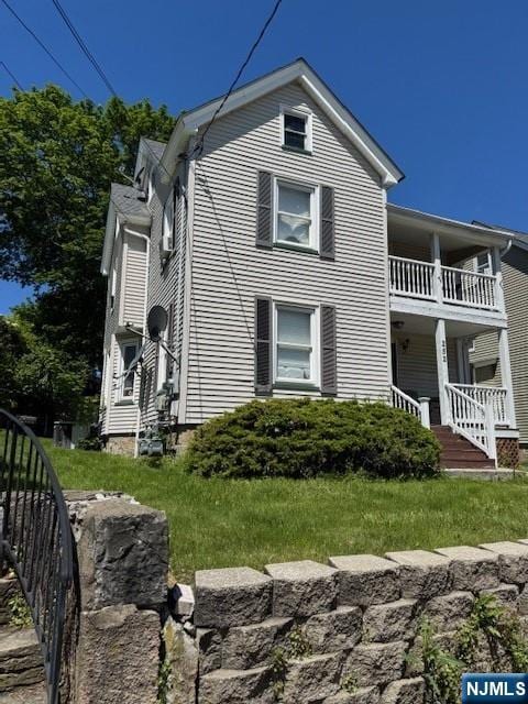252 Spring St, Newton, NJ 07860 - view of side of property featuring covered porch and a balcony