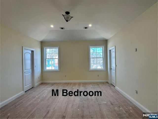 178 Leonard Pl, North Arlington, NJ 07031 - empty room with wood finished floors, lofted ceiling, and recessed lighting