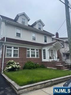 167 Linden Ave, Belleville, NJ 07109 - american foursquare style home featuring brick siding and a front yard