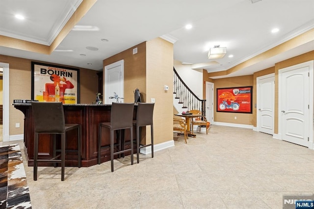511 Bellaire Dr, Demarest, NJ 07627 - indoor dry bar featuring crown molding, stairs, baseboards, and recessed lighting