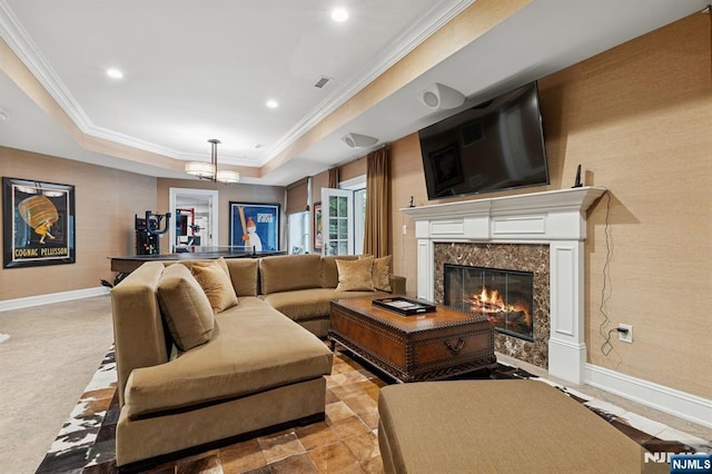 511 Bellaire Dr, Demarest, NJ 07627 - living area featuring a tray ceiling, baseboards, crown molding, a premium fireplace, and recessed lighting