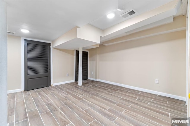 99 W 50th St, Bayonne, NJ 07002 - finished basement featuring baseboards, light wood-type flooring, and recessed lighting