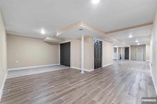 99 W 50th St, Bayonne, NJ 07002 - unfurnished living room featuring light wood-style floors, baseboards, and recessed lighting