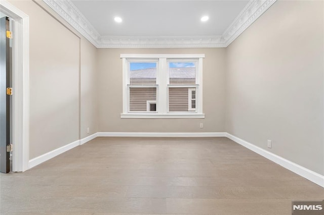 99 W 50th St, Bayonne, NJ 07002 - spare room with ornamental molding, wood finished floors, baseboards, and recessed lighting