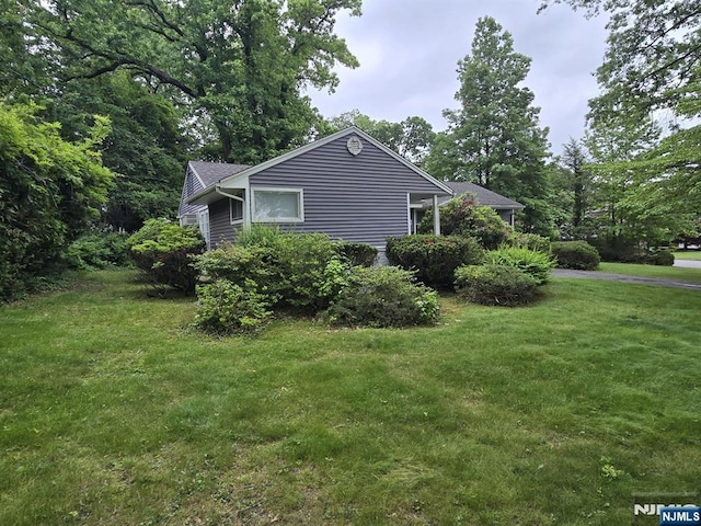 195 Concord Dr, Paramus, NJ 07652 - view of side of property with a lawn