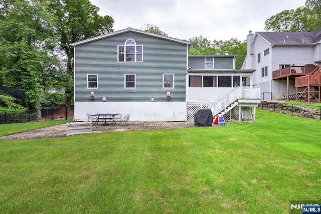 25 Fern Ter, Wayne, NJ 07470 - back of property featuring a sunroom and stairs
