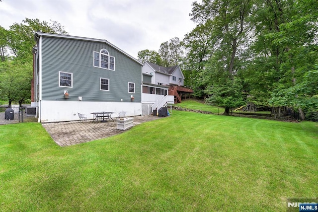 25 Fern Ter, Wayne, NJ 07470 - back of house with a patio