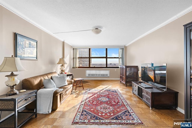 7004JFKB 70th Unit 40G, Guttenberg, NJ 07093 - living room featuring crown molding, a textured ceiling, and baseboards