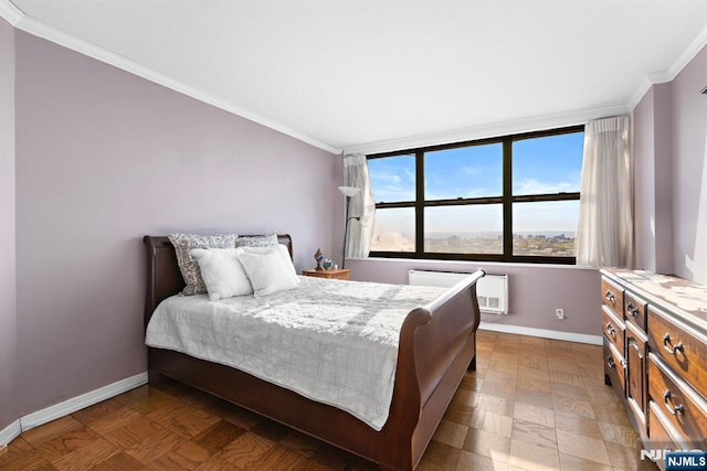 7004JFKB 70th Unit 40G, Guttenberg, NJ 07093 - bedroom with crown molding, baseboards, and an AC wall unit