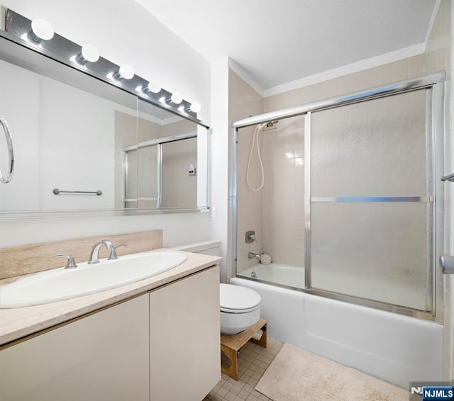 7004JFKB 70th Unit 40G, Guttenberg, NJ 07093 - full bathroom featuring vanity, toilet, shower / bath combination with glass door, tile patterned flooring, and ornamental molding