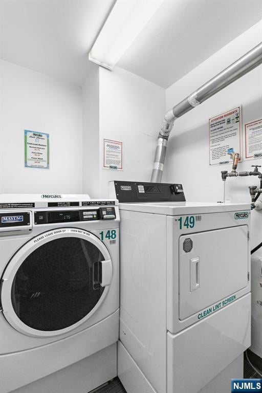 7004JFKB 70th Unit 40G, Guttenberg, NJ 07093 - shared laundry room featuring washer and clothes dryer