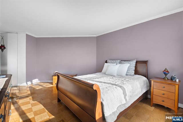 7004JFKB 70th Unit 40G, Guttenberg, NJ 07093 - bedroom featuring baseboards and ornamental molding