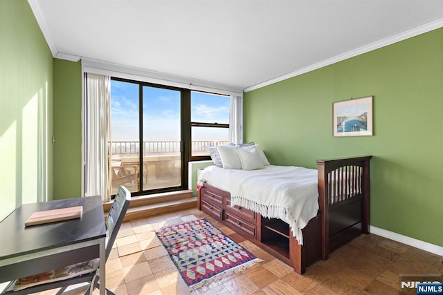 7004JFKB 70th Unit 40G, Guttenberg, NJ 07093 - bedroom featuring ornamental molding, access to outside, and baseboards