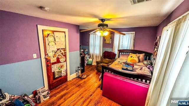 18 Trinity Pl, Kearny, NJ 07032 - bedroom with wood finished floors and a ceiling fan