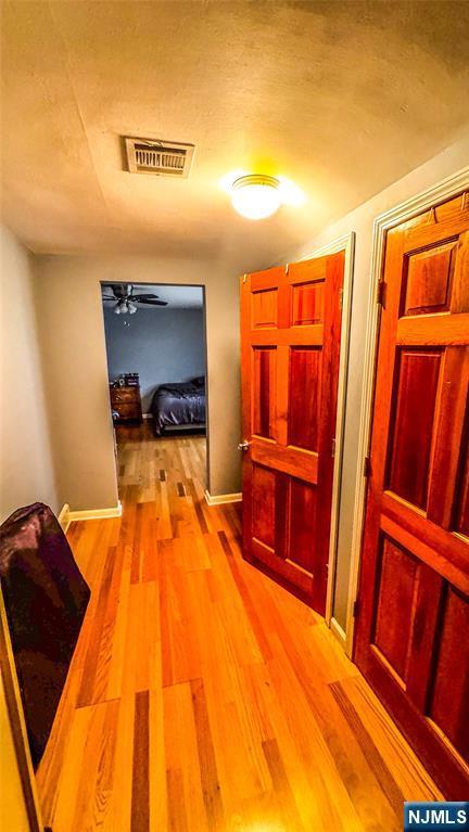 18 Trinity Pl, Kearny, NJ 07032 - corridor with light wood-style flooring