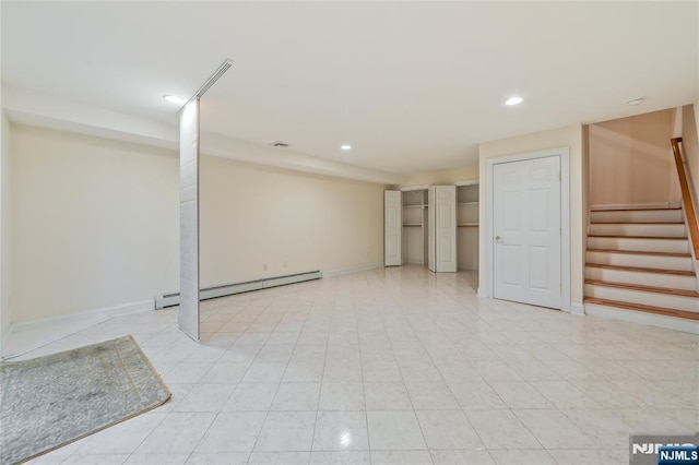 445B 7th St Unit B, Palisades Park, NJ 07650 - finished basement with a baseboard heating unit, stairway, recessed lighting, and light tile patterned floors
