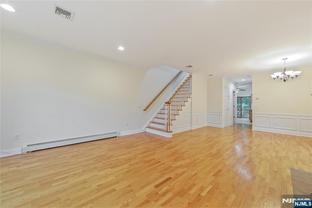 445B 7th St Unit B, Palisades Park, NJ 07650 - unfurnished living room featuring a baseboard radiator, ornamental molding, a chandelier, stairs, and light wood-style floors