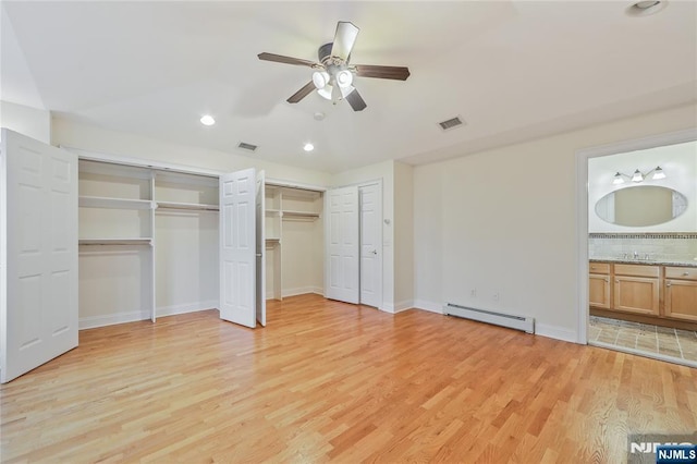 445B 7th St Unit B, Palisades Park, NJ 07650 - unfurnished bedroom with baseboard heating, light wood-style flooring, multiple closets, recessed lighting, and connected bathroom