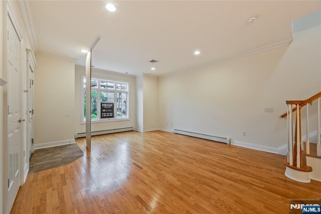 445B 7th St Unit B, Palisades Park, NJ 07650 - unfurnished room featuring baseboard heating, crown molding, light wood-type flooring, recessed lighting, and a smoke detector