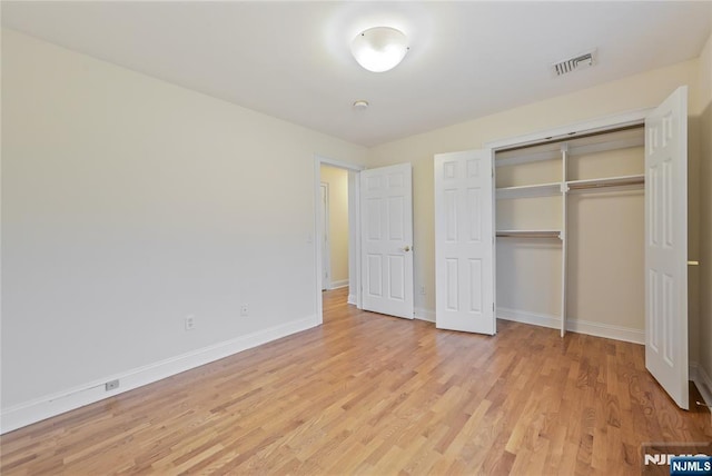 445B 7th St Unit B, Palisades Park, NJ 07650 - unfurnished bedroom featuring light wood-style flooring and a closet