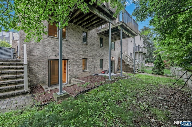 445B 7th St Unit B, Palisades Park, NJ 07650 - back of house with brick siding and stairs