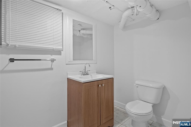 548 Jefferson Ave, Elizabeth, NJ 07201 - half bath with toilet, vanity, and baseboards