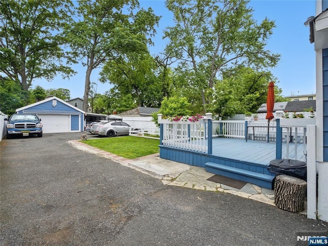 548 Jefferson Ave, Elizabeth, NJ 07201 - gate with a wooden deck and an outdoor structure