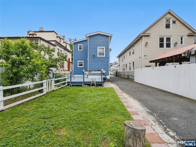 548 Jefferson Ave, Elizabeth, NJ 07201 - rear view of house featuring a deck