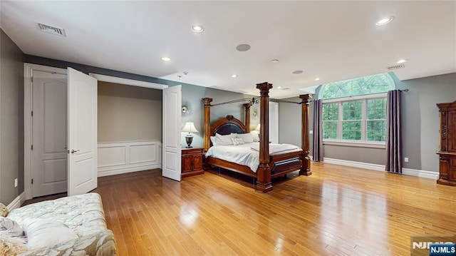 87 Skytop Dr, Mahwah, NJ 07430 - bedroom featuring light wood-type flooring, wainscoting, and recessed lighting