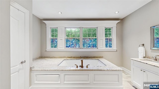 87 Skytop Dr, Mahwah, NJ 07430 - bathroom featuring vanity, a garden tub, and recessed lighting