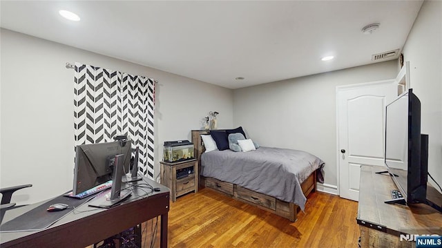 87 Skytop Dr, Mahwah, NJ 07430 - bedroom featuring wood finished floors, an office area, and recessed lighting