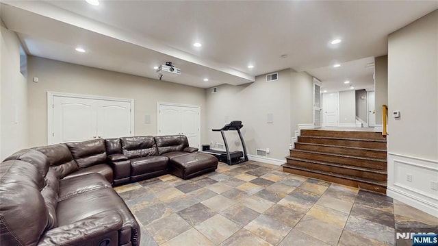 87 Skytop Dr, Mahwah, NJ 07430 - living room with recessed lighting, stone finish flooring, and stairway