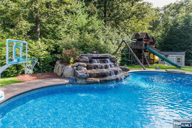 87 Skytop Dr, Mahwah, NJ 07430 - outdoor pool featuring a playground